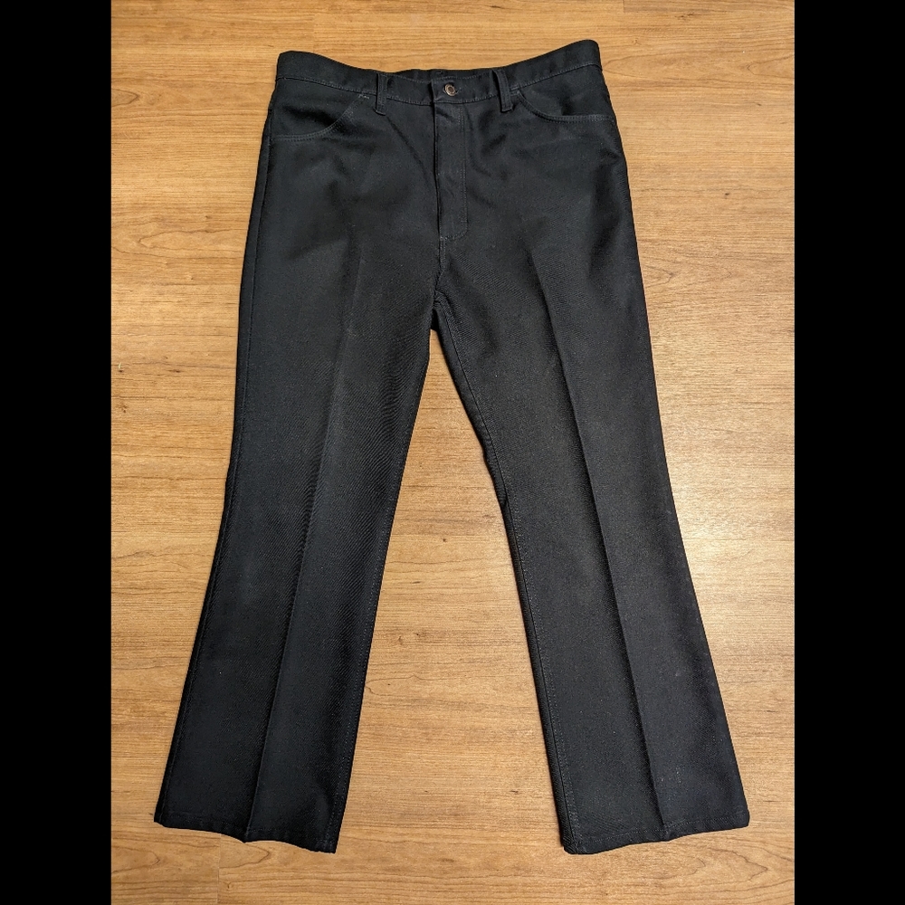 Black Wrangler pants, size 38